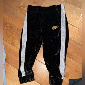 Nike Kids Black Joggers with Gray Stripes